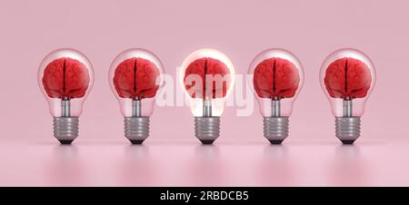Cerveau à l'intérieur d'une ampoule illuminée se démarquant de la foule sur fond rose. Concept d'inspiration, de créativité, d'idée, d'éducation, d'innovation. Banque D'Images