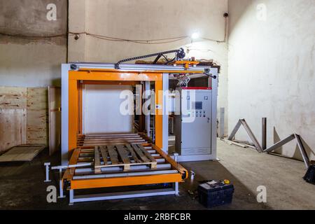 Machine d'emballage, d'ensachage et d'empilage du ciment Banque D'Images