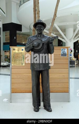 Statue de George Formby dans le centre commercial Grand Arcade à Wigan Banque D'Images