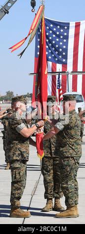 Outgoing U.S. Marine Corps Air Station Yuma commanding officer Col. Charles Dudik (right) passes the colors to incoming commanding officer Col. Jared Stone (left) during the Change of Command ceremony on the flightline at MCAS Yuma, in Yuma, Ariz., Thursday, June 29, 2023. Dudik, a graduate of the U.S. Naval Academy, assumed command of MCAS Yuma in July 2020. Stone is making his second stop at MCAS Yuma, arriving first in 2004 with Marine Aviation Weapons and Tactics Squadron One and serving as an instructor in the EA-6B division, as the Electronic Warfare subject matter expert in the Aviation