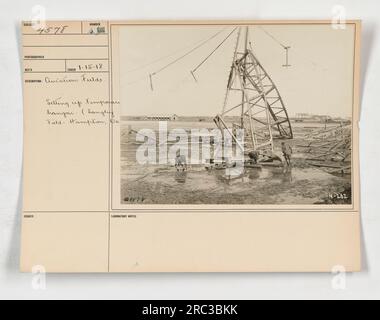 Image montrant des soldats américains installant un hangar temporaire au Langley Field à Hampton, en Virginie, pendant la première Guerre mondiale. Le hangar est en cours de préparation pour stocker du carburant d'aviation pour les avions militaires. La date d'enregistrement de l'image est le 15 janvier 1918. Banque D'Images