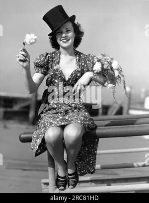 Atlantic City, New Jersey : c. 1938 cette femme est la bailleur officielle des œillets à la Parade de Pâques d'Atlantic City Banque D'Images