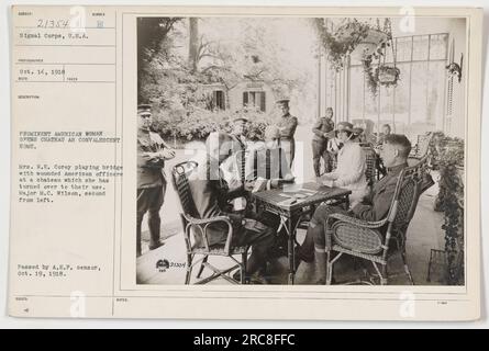 Mme W.E. Corey ouvre un château comme maison de convalescence pour les officiers américains blessés pendant la première Guerre mondiale Sur cette image, elle joue au pont avec les officiers, dont le major M.C. Wilson (deuxième à partir de la gauche). La photographie a été prise le 14 octobre 1918 et publiée après autorisation par le censeur de l'A.E.P. le 19 octobre 1918. Banque D'Images