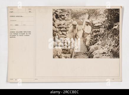 Les soldats français renforcent l'entrée de leur tranchée partiellement détruite pendant la première Guerre mondiale. L'image montre leurs efforts pour réparer les dégâts causés par l'ennemi. Cette photographie a été prise en 1919 et fait partie de la collection officielle française WUNDER 1545. Banque D'Images