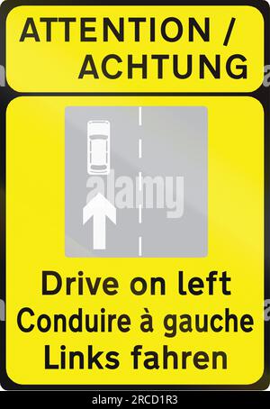 Le panneau d'avertissement trilingue en Irlande - Drive on Left est écrit en anglais, français et allemand. Banque D'Images