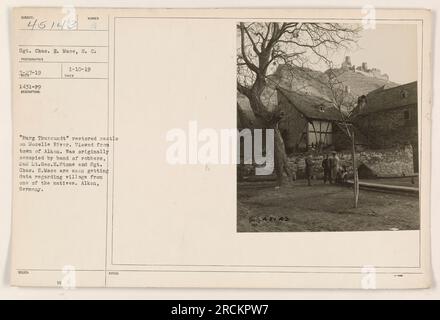 Château restauré 'Burg Thursandt' sur la Moselle, vue depuis la ville d'Alken. Initialement occupé par une bande de voleurs, l'image montre 2nd Lt. Geo. E. Stone et Sgt. Chas. Mace collecte des données de l'un des locaux. Prise à Alken, Allemagne. Sgt. Chas. E. Mace, S.C., a photographié la scène le 3-27-19 avec une description et un numéro émis le 1-10-19. Les notes indiquent le numéro de référence 45143. Banque D'Images