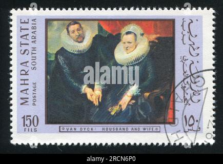 ARABIE DU SUD - CIRCA 1972 : timbre imprimé par l'Arabie du Sud, montrant mari et femme par Van Dyck, circa 1972 Banque D'Images