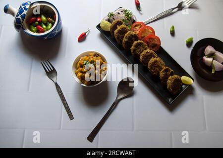 Vue du dessus de l'ingrédient alimentaire chole kebab ou masala aux pois chiches. Banque D'Images