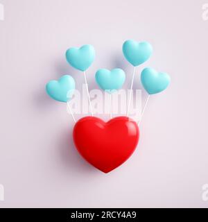 Concept de ballons en forme de coeur. Petits coeurs bleus connectés avec un grand coeur rouge sur fond rose. Vue de dessus. Rendu 3D. Banque D'Images