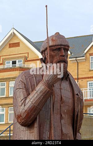 Sculpture en acier pour Filey - A High Tide in Short Wellies, par l'artiste Ray Lonsdale, The Beach Rd, Filey, North Yorkshire, Angleterre, ROYAUME-UNI, YO14 9LW Banque D'Images