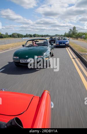 Grandes voitures de sport de différentes générations - Mk1 ma Mazda MX5, MG Midget, MG-F et Mk1 VW Golf GTI Banque D'Images