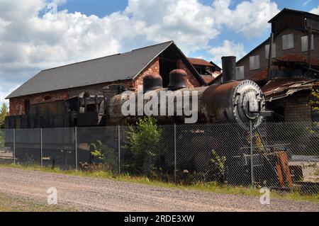 La locomotive historique se trouve à l'intérieur de la clôture de la fonderie de cuivre Quincy à Hancock, Michigan. Banque D'Images