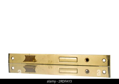 Une serrure en métal mortaise, macro, isolé sur fond blanc. Banque D'Images
