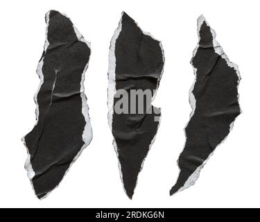 Morceaux de papier noir déchiré en forme de griffe d'animal sur fond blanc avec chemin de découpage Banque D'Images