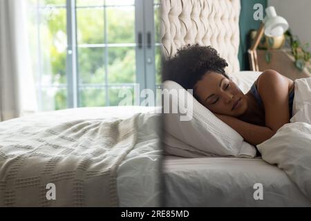 Femme biracial dormant dans le lit dans la chambre Banque D'Images