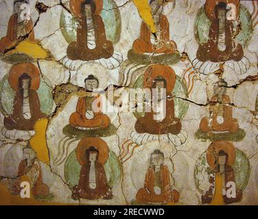 Bouddha peintures du IX siecle, sur un fragment de peinture murale provenant des 'Grottes des mille Bouddhas' de Kumtura, dans la région autonome de Xinjiang. Photographie, Musee National de Seoul, République de Coree, 2006. Banque D'Images