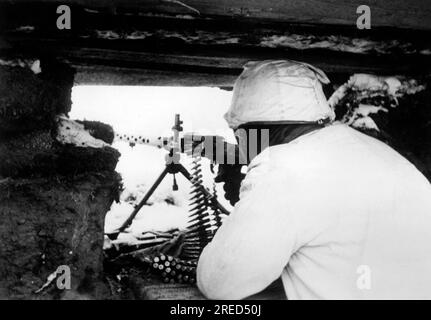 Mitrailleuse Waffen-SS pendant les combats sur le front de l'est. Photo : Hoppe [traduction automatique] Banque D'Images