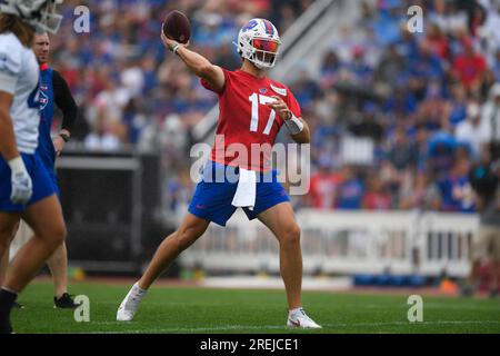 FILE - Buffalo Bills quarterback Josh Allen (17) signs a bottle of barbecue  sauce for a fan after practice at the NFL football team's training camp in  Pittsford, N.Y., Thursday, July 27