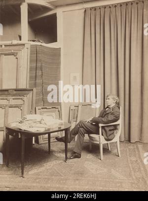 Whistler assis sur une chaise dans son Studio 1893 de Dornac à Paris (rue notre-Dame-des-champs) Banque D'Images