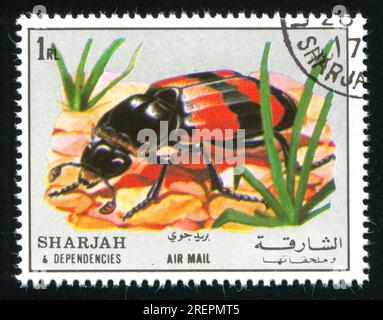 SHARJAH ET DÉPENDANCES - CIRCA 1972 : timbre imprimé par Sharjah et dépendances, montre entomologie, circa 1972 Banque D'Images