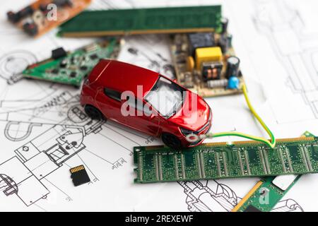 Photographie qui exprime l'image d'un véhicule autonome connecté à l'aide d'une carte mère. Banque D'Images