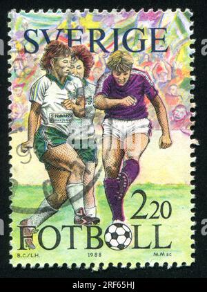 SUÈDE - CIRCA 1988 : timbre imprimé par la Suède, montre football, circa 1988 Banque D'Images