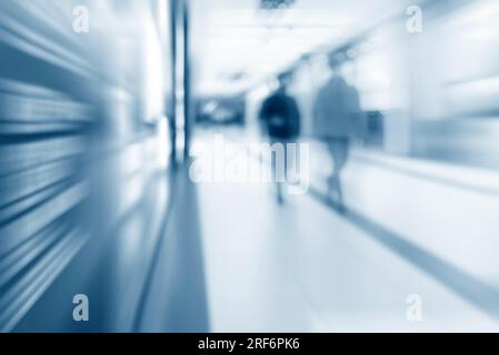 Motion Blurred Personnes dans le centre commercial Banque D'Images