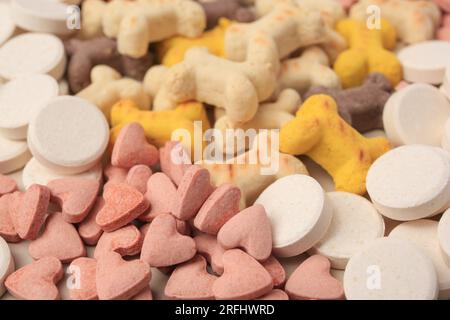 Beaucoup de vitamines différentes pour les animaux de compagnie comme fond, closeup Banque D'Images