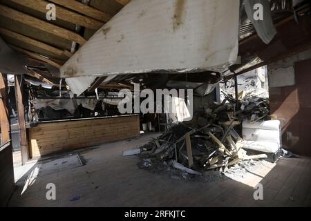 KRAMATORSK, UKRAINE - 29 JUILLET 2023 - le restaurant RIA Pizza détruit lors de la frappe russe Iskander le 27 juin 2023, est en ruines, à Kramat Banque D'Images