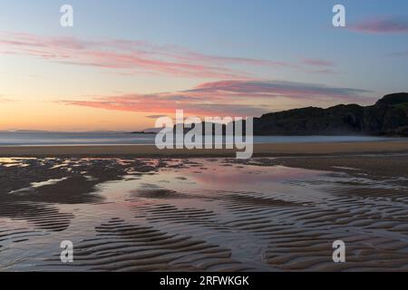 Coucher de soleil, Kiloran Bay, Colonsay, Écosse Banque D'Images