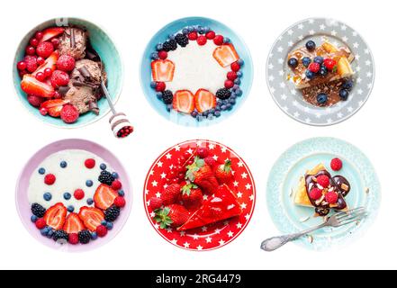 Ensemble de desserts isolés ou de collations avec des baies fraîches. Yaourt grec, tranche de gâteau, crème glacée et cheesecake sur des assiettes colorées. Idées de menu Banque D'Images
