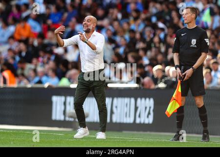 LONDRES, Royaume-Uni - 6 août 2023 : le Manager de Manchester City PEP Guardiola réagit lors du match FA Community Shield entre Arsenal et Manchester City à W. Banque D'Images