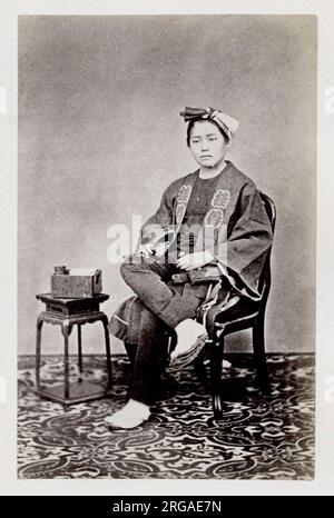 Photographie du XIXe siècle - Portrait photographique du Japon, probablement l'œuvre du photographe japonais Shimooka Renjo - assis Banque D'Images