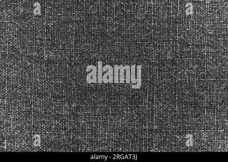Texture de tissu de laine dense noir pour la confection. Textile. Matériau. Laine Banque D'Images