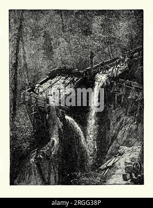 Une vieille gravure d'hommes à la recherche d'or dans les écluses d'eau et les courses en 1848, les premiers temps de la ruée vers l'or californienne dans les contreforts de la Sierra Nevada, Californie, États-Unis. Il est tiré d'un livre d'histoire américain de 1895. L’or a été découvert pour la première fois à Sutter’s Mill (d’après son propriétaire John Sutter), une scierie hydraulique située sur la rive de la rivière South Fork American, dans la Sierra Nevada, en Californie. Un ouvrier qui construisait le moulin, James W. Marshall, y trouva de l'or en 1848. Cette découverte a déclenché la ruée vers l'or de Californie de 1848-1855. Banque D'Images
