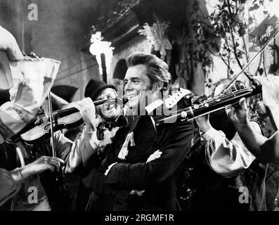 Dirk Bogarde, sur le plateau du film, 'Song Without End', Columbia Pictures, 1960 Banque D'Images