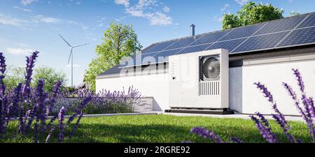 Toit vert avec couverture d'herbe et une pompe à chaleur installée avec panneaux photovoltaïques sur le toit d'une maison unifamiliale. Une source écologique de heati Banque D'Images