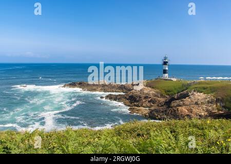 Le phare sur isla Pancha en Galice, côte atlantique de l'Espagne Banque D'Images