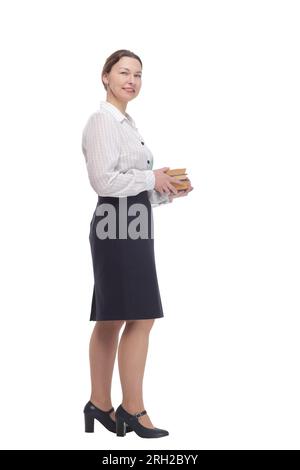 en pleine croissance. femme d'affaires avec une pile de livres. isolé sur fond blanc. Banque D'Images