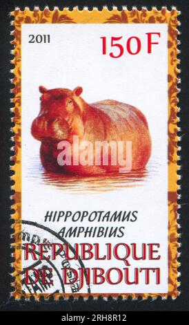 DJIBOUTI - CIRCA 2011 : timbre imprimé par Djibouti, montre hippopotame, circa 2011 Banque D'Images