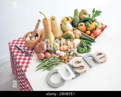 D'en haut composition de la cuisine de mot placé sur la table blanche près de pile de citrouilles mûres fraîches et tomates et poivrons avec des oignons et de l'ail Banque D'Images