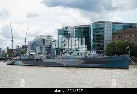 HMS Belfast. Former Royal Navy Town-class light cruiser now a museum ship moored on the River Thames. London, England, UK Stock Photo