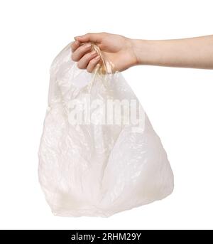 Femme tenant le sac en plastique vide sur fond blanc, closeup Banque D'Images