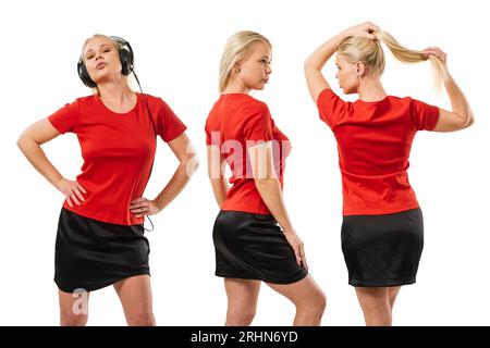 Photo d'une jeune femme posant avec un t-shirt rouge vierge prêt pour votre œuvre d'art ou design. Banque D'Images