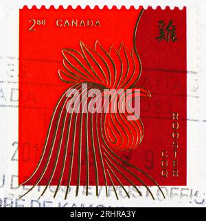 MOSCOU, RUSSIE - JUIN 8 2023 : le timbre-poste imprimé au Canada montre l'année du coq, le nouvel an chinois 2017 - l'année de la série du coq, vers 2017 Banque D'Images