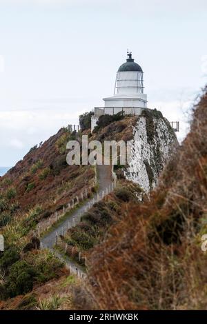 Phare situé à Nugget point dans les Caitlans, en Nouvelle-Zélande Banque D'Images