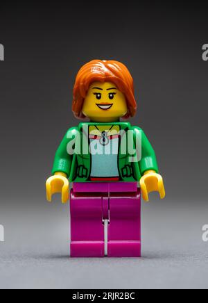 Antalya, Turkey - August 22, 2023: Traveler Lego female character on dark background Stock Photo