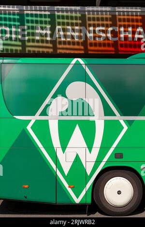 Bremen, Germany, August 22th 2023. Bremen Werder bus in the parking lot. Football club transport with emblem Stock Photo