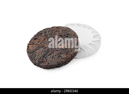 Disc shaped traditional Chinese pu-erh tea isolated on white Stock Photo