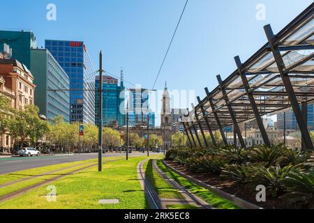 Adelaide, Australia - September 27, 2019: Victoria Square with tram lines running along King William street viewed towards north on a bright day Stock Photo